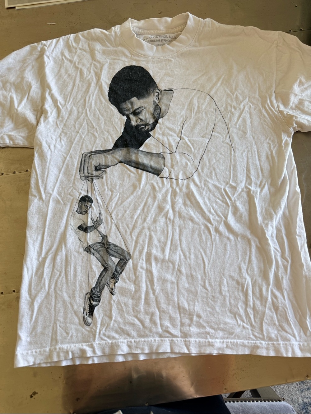 Kid Cudi Graphic White Men’s Crewneck T-Shirt with Front and Black Illustration